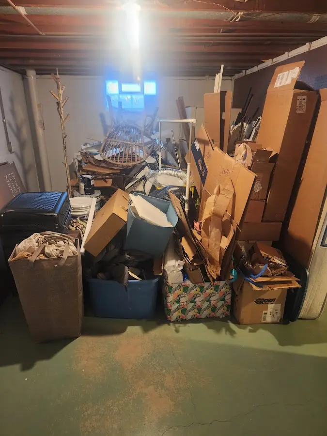 Roll-off dumpster container at job site for 8 Yard Dumpster Rental in Fort Leonard Wood